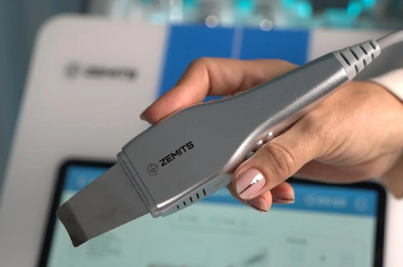 Zemits Ultrasonic Skin Scrubber handpiece with flat spatula tip for gentler cleansing protocols